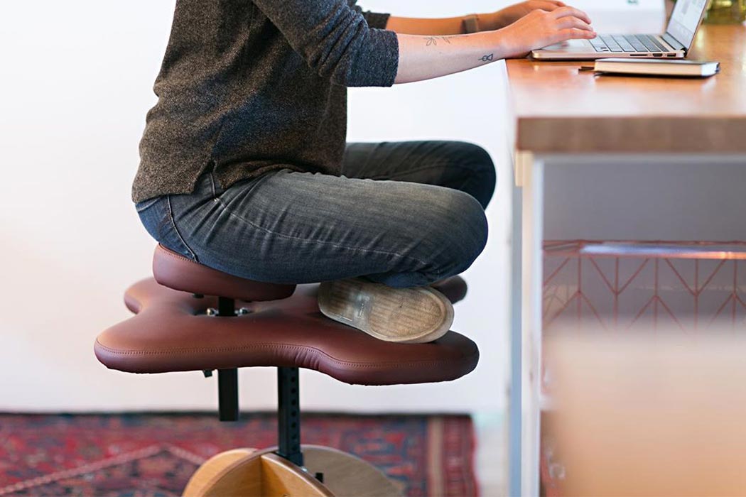 THIS CHAIR WAS DESIGNED TO LET YOU SIT CROSS-LEGGED FOR BETTER POSTURE AND HEALTH!