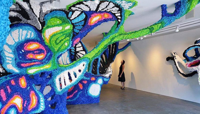 crystal wagner recycles single-use materials into gigantic colorful sculptures