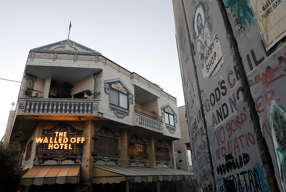 Mysterious artist Banksy unveils dark nativity in Bethlehem