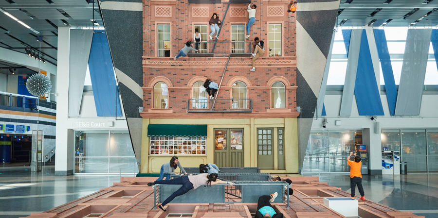 leandro erlich`s surreal installation in new jersey invites you to climb + explore a brick façade