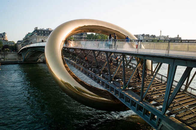 plastique fantastique`s ringed installation envelops parisian footbridge for nuit blanche 2023