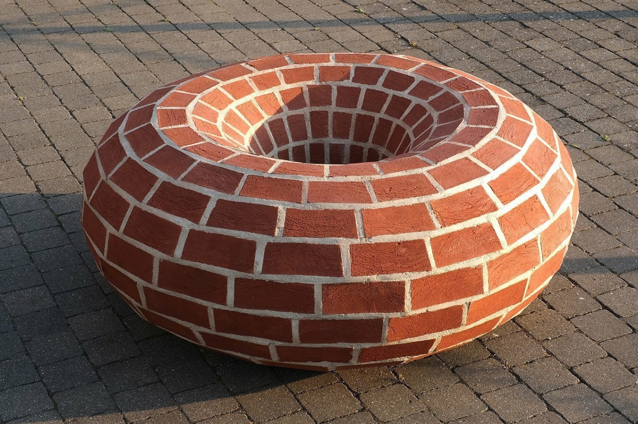 Repurposed Bricks find a new home with this round bench at historic London wharf