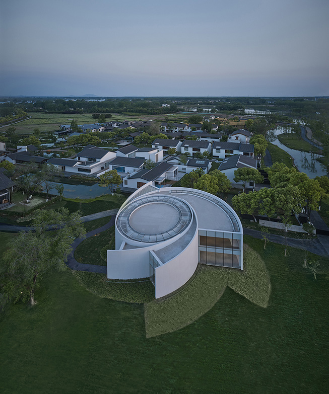 Spiral gallery by protoscapes unravels like a white flower in rural china