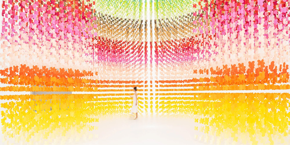 Emmanuelle moureaux`s colorful installation veils visitors amidst a myriad of butterflies