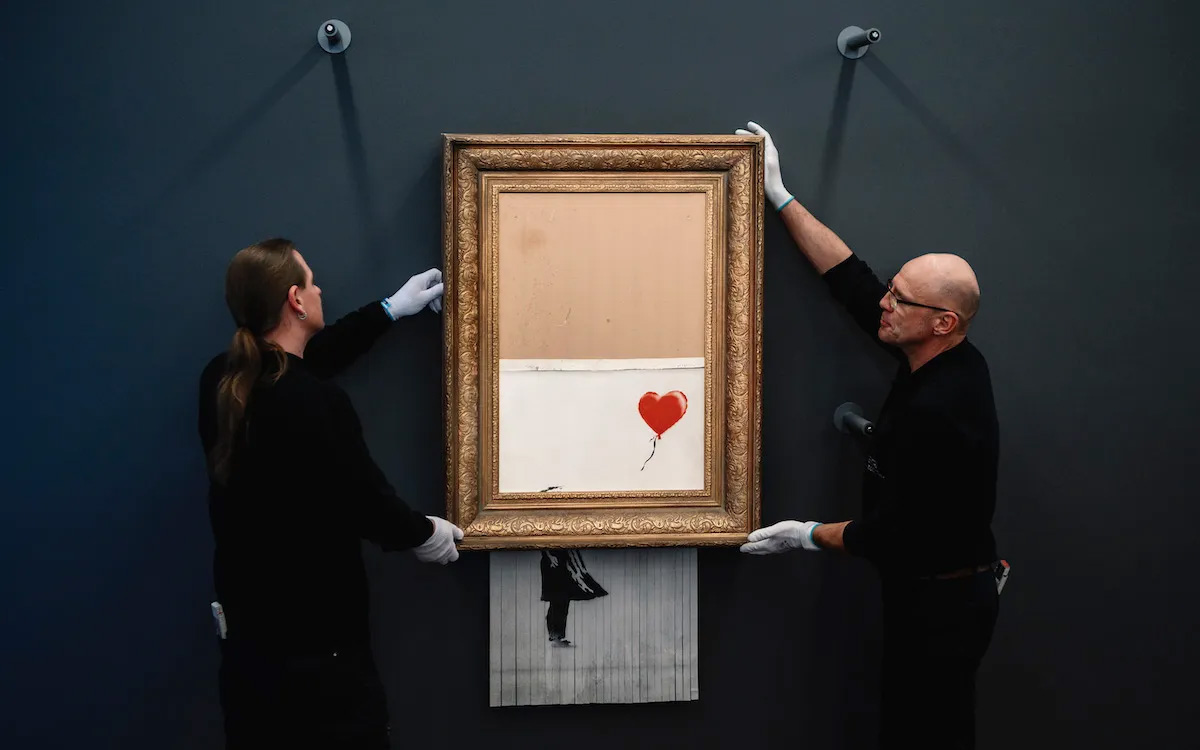 Banksy`s Famous Shredded Painting is Retitled and Redated for the Second Time