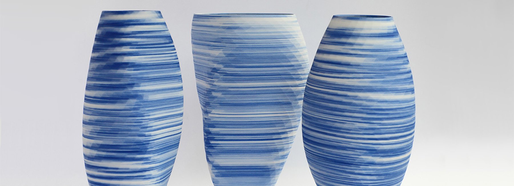 3D-printed porcelain vases by olivier van herpt in blue and white