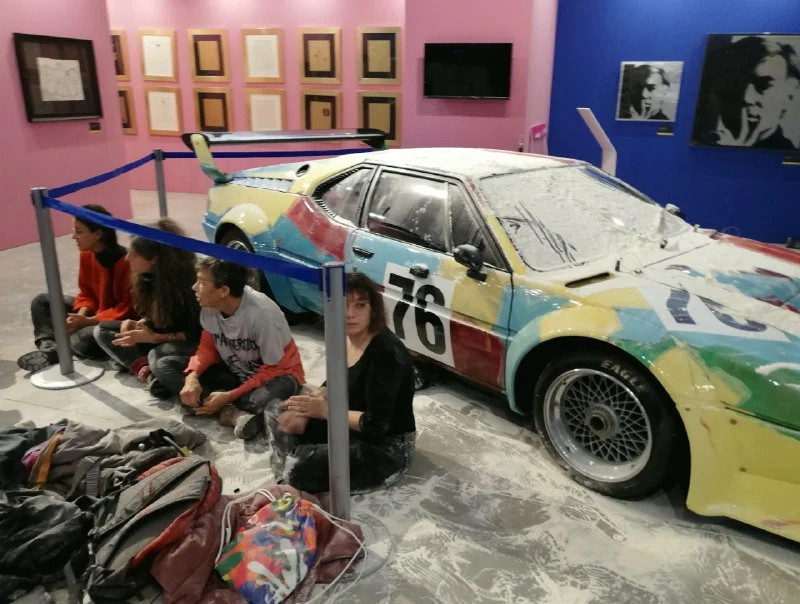 Climate Activists Throw Flour on Warhol-Painted BMW Art Car in Milan