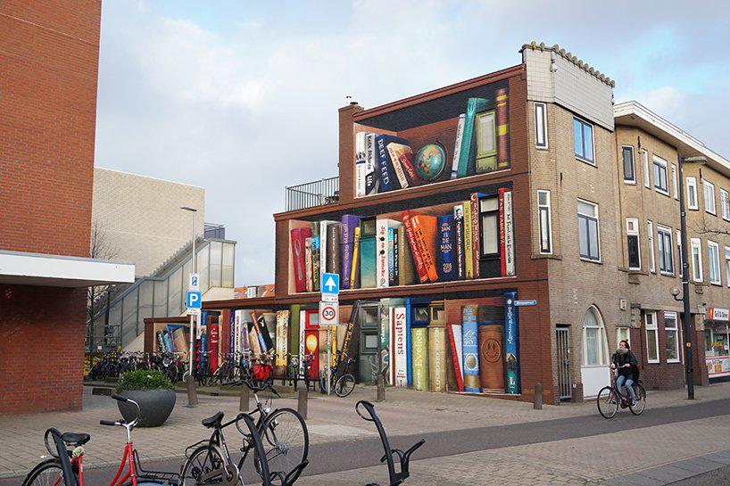 curated by the neighborhood, this book shelf illusion features 8 languages and cultures