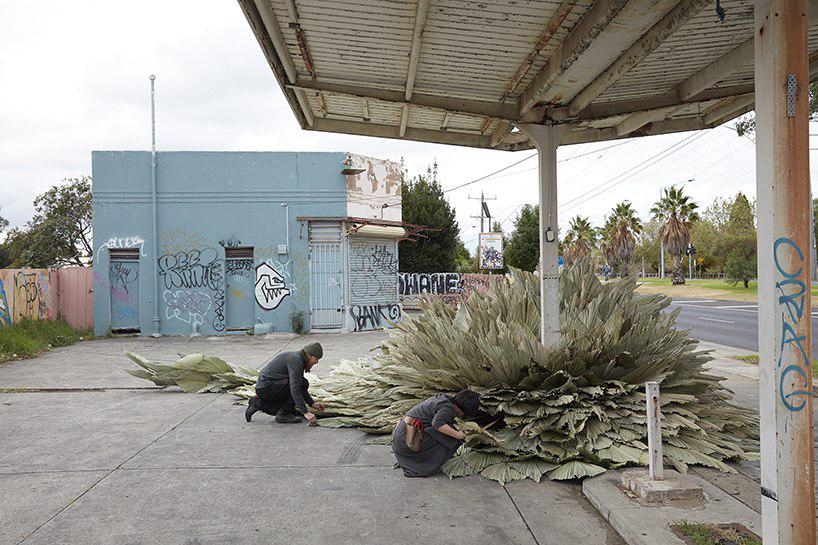 loose leaf studio takes over a disused petrol station with botanical installatio