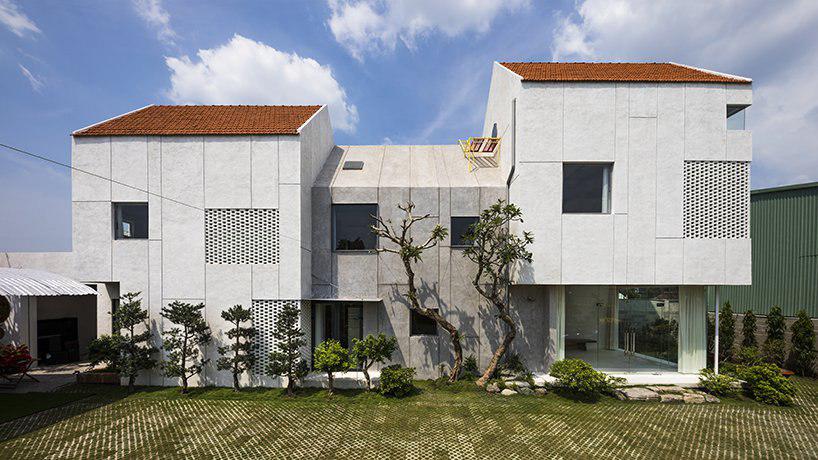 time architects builds house for three families with open living spaces in vietnam