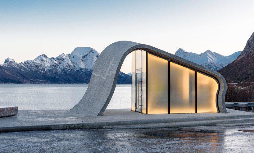 HZAs public toilets in norway feature a concrete ceiling that waves up from the floor