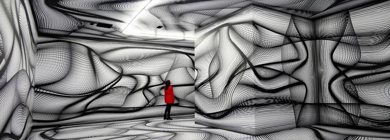 peter kogler transforms rooms with hypnotic installations featuring optical illusions