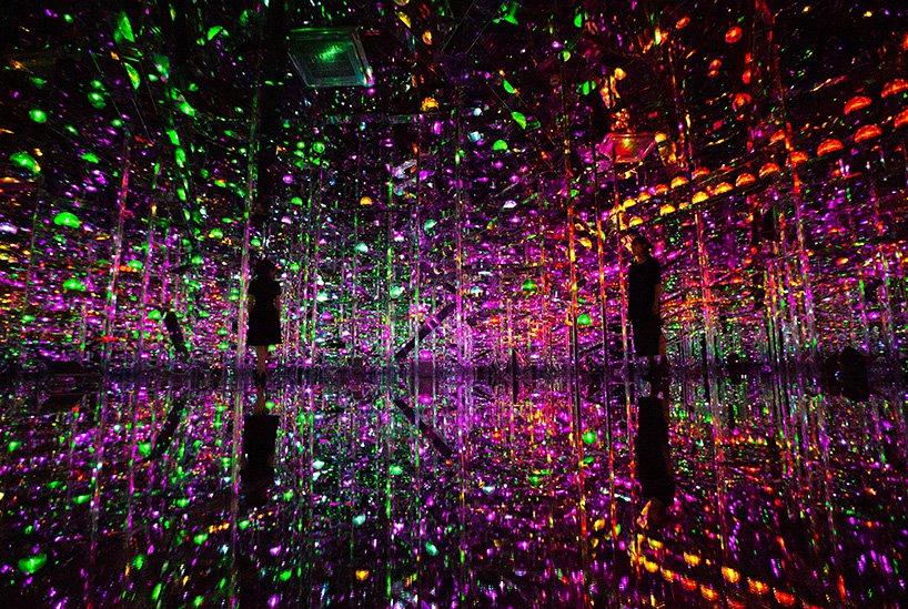 teamLab creates a borderless microcosmose fusing light sound and art in shanghai