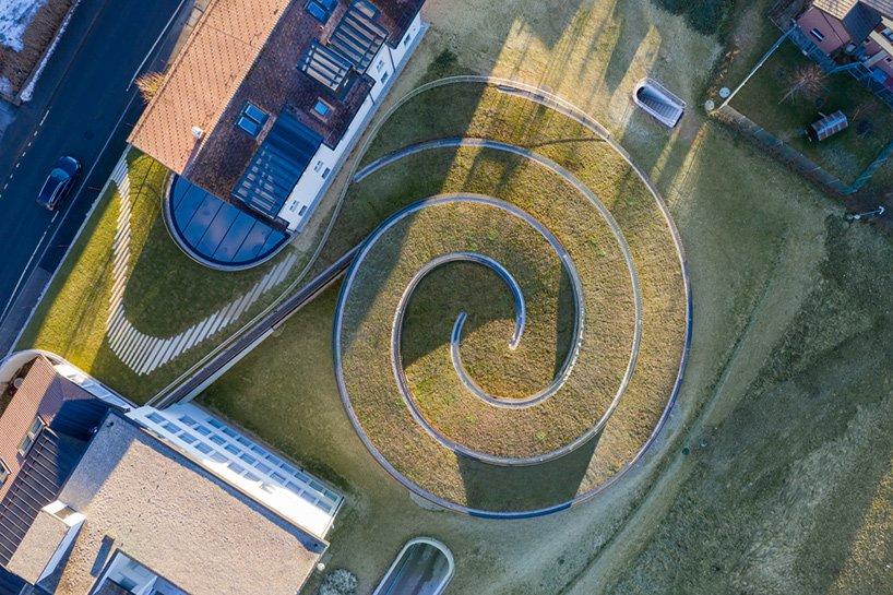 audemars piguets spiraling museum designed by BIG opens to the public in switzerland