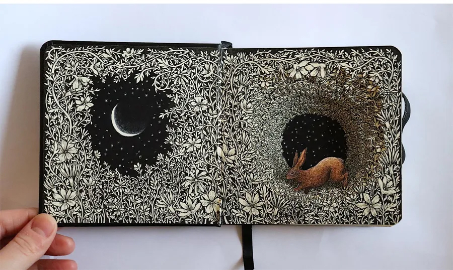 Isobelle Ouzman`s altered books with fairytale scenes inside