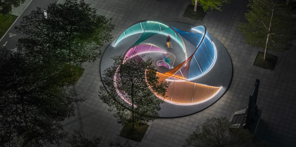 MARS studio`s isle of light installation weaves an urban island of shifting color in shenzhen